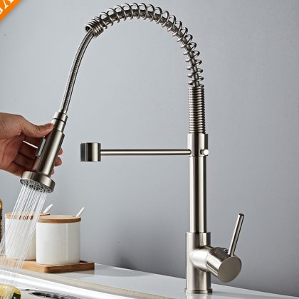 Deck mount kitchen faucet with pull down sprayer